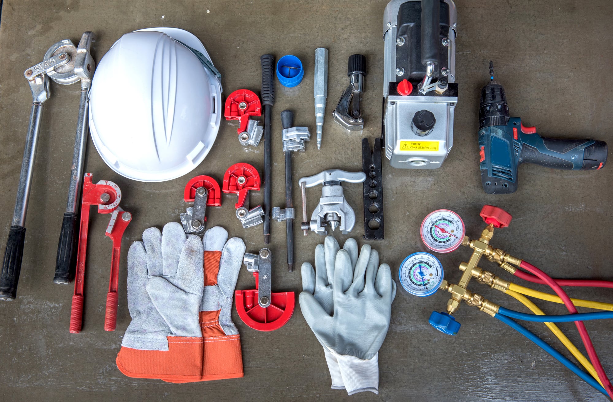 arrangement of PPE on a concrete floor